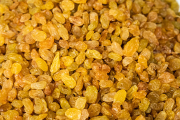 Raisins - dried grapes. Quiche or sabza on the heap. Selling delicacies in the market. Day. Georgia.