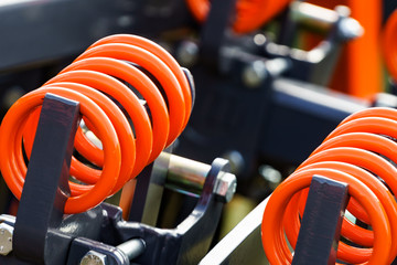 Industrial spring at agricultural machine