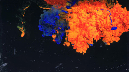 Macro photo shoot of colorful Ink in water. Power magic multi color Underwater Paint Drops...