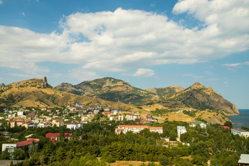 Fototapeta na wymiar Landscape View On Massive Mountains On Kurortnoe Settlement In Crimea, Russia.