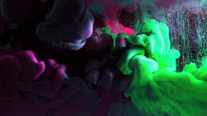 Macro photo shoot of colorful Ink in water. Power magic multi color Underwater Paint Drops...