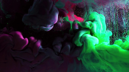 Macro photo shoot of colorful Ink in water. Power magic multi color Underwater Paint Drops...