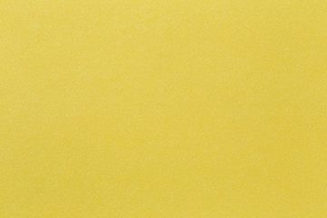 Texture of yellow paper cardboard art background.