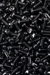 screw container for industrial construction as a group creates a wallpaper on black color 