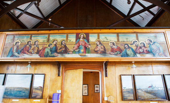 Port Stanley, Falkland Islands, interior of St. Mary's Catholic Church.
 Above the entrance of the Church inside is a painting of the last supper.