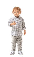 Cute little boy showing thumb-up gesture on white background