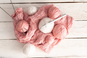 Incomplete knitting project with wooden needles