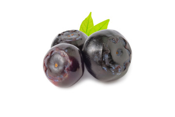 Blueberry with leaves isolated on white backgrounds.