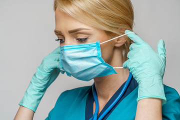 medical doctor nurse woman with stethoscope wearing protective mask