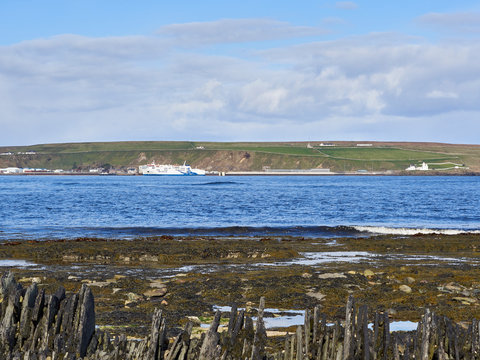 Scrabster harbour with a ferry waiting to leave. Near Thurso, Caithness, Scottish Highlands, Scotland.