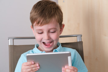 young boy with tablet