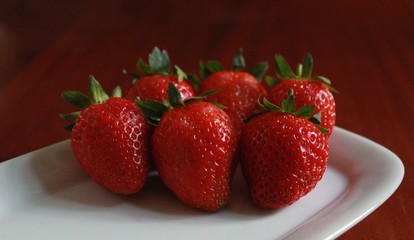 strawberries on a white plate