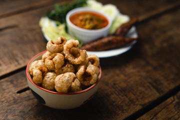 Crispy pork and chili paste and blanched vegetables in a dish