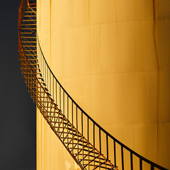 Obraz premium Closeup of industrial storage tank with shadow detail from the steps. Image is modern and quite abstract