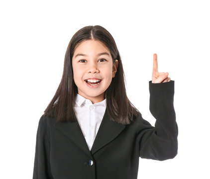 Cute little businesswoman with raised index finger on white background