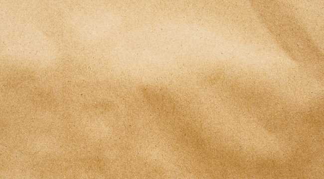Brown paper eco recycled kraft sheet texture cardboard background