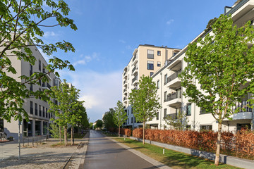 Cityscape of a residential area with modern apartment buildings, new green urban landscape in the city
