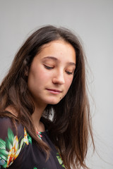 Thoughtful despondent young woman