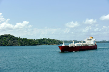 Gas tanker ship transiting through Panama Canal on her international trade route. 