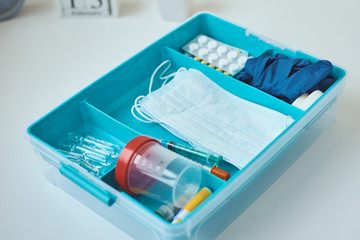 First aid kit  close up. Home medicine box with a medical items. Healthcare and medicine concept.