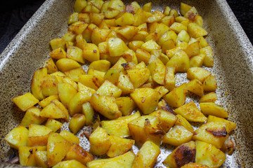 baked potatoes on a baking sheet