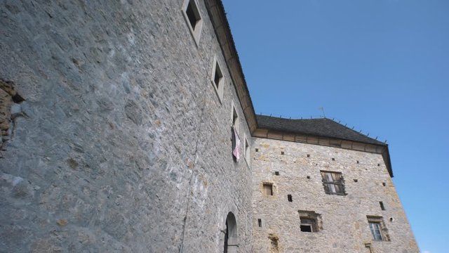 Ruins of castle Kostel with belltower in Kolpa river valley, Slovenia