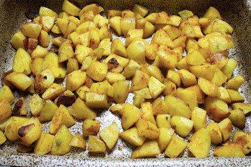baked potatoes on a baking sheet