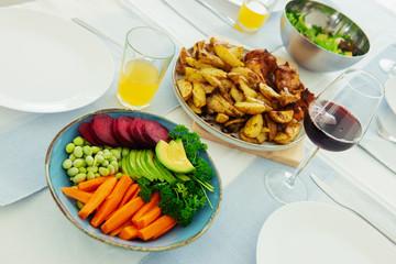 Closeup photo of served table with healthy vegetablesbowl and baked potato