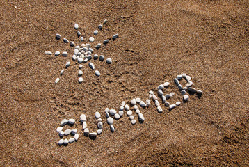 Summer picture from pebble and sand on a beach