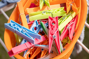 clothespins for hanging cloths in a container