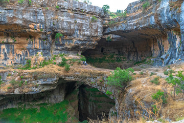 Fototapeta na wymiar Baatara Gorge Waterfall,Near Tannourine, Lebanon Drops 250m Through Sinkholes and Rock Bridges