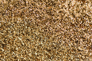 Sparkly gold glitter background texture