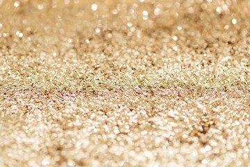 Sparkly gold glitter background texture