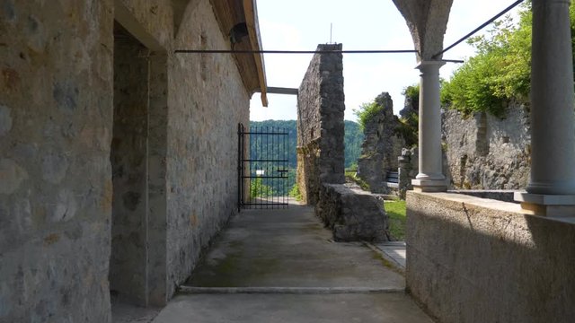 Ruins of castle Kostel with belltower in Kolpa river valley, Slovenia