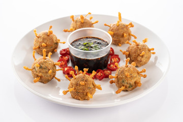 fried steamed tofu with minced meat and enoki mushroom on white background covid-19 look