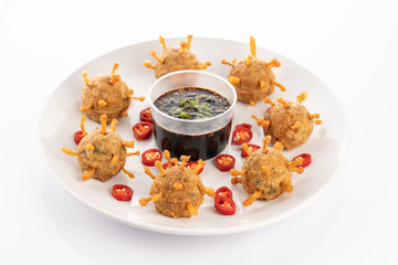 fried steamed tofu with minced meat and enoki mushroom on white background covid-19 look