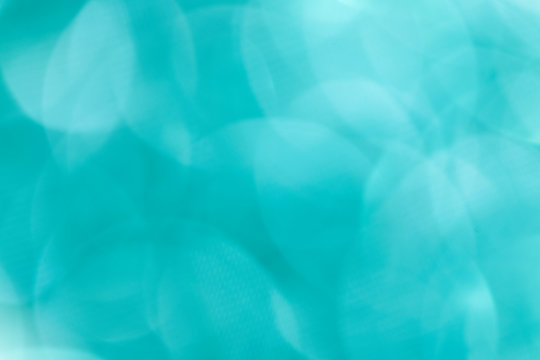 Shiny Blurry Turquoise Glitter Textured Background