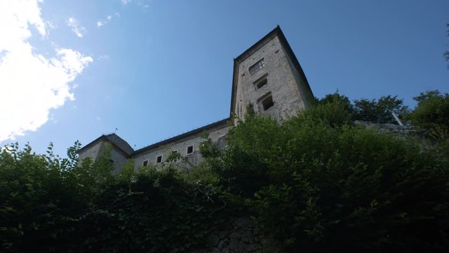 Ruins of castle Kostel with belltower in Kolpa river valley, Slovenia