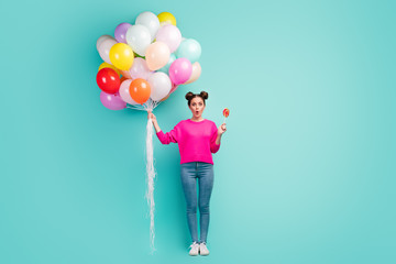 Full length body size view of her she nice attractive amazed cheerful wavy-haired girl holding in hand bunch air balls isolated over bright vivid shine vibrant green blue color background