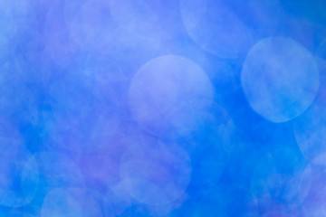 Abstract bright blue bokeh background