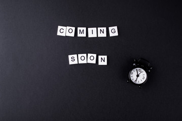 Coming soon from small wooden cubes on chernom fone.