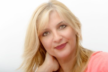 Naklejka premium Portrait of mature smiling blond woman