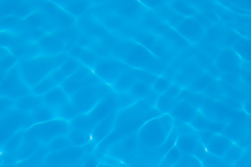 Blue water ripple reflection in the swimming pool