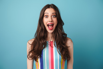 Photo of excited nice woman expressing surprise at camera