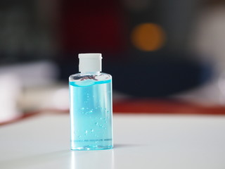 Hand Sanitizer, gel alcoholic mixture with gelatin in clear Plastic bottle with pump pushing wash clean dirty to prevent germs protect Contagious disease corona virus, covid-19