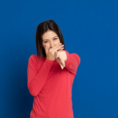 Brunette young woman wearing a red T-shirt