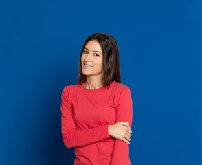 Fototapeta premium Brunette young woman wearing a red T-shirt