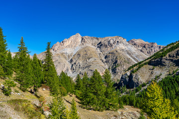 Landscape view of Col de la Cayolle pass and surrounding mountains in France