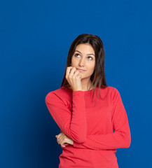 Brunette young woman wearing a red T-shirt