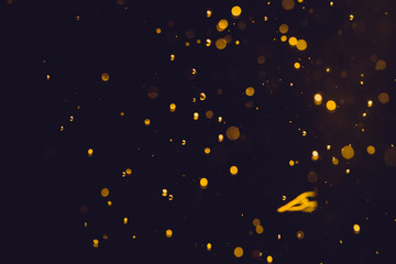 Dark Abstract Gold bokeh sparkle on black